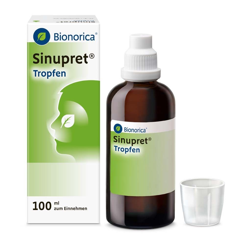 Sinupret® Tropfen-Verpackung und Flasche. Braune Flasche mit weißem Verschluss und Messbecher. Produktname und Logo.
