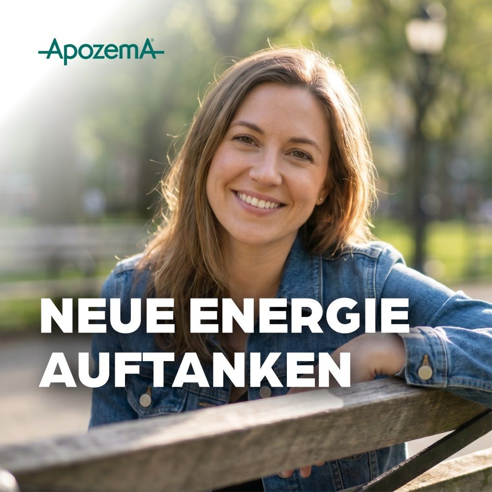 Lächelnde Frau im Freien, Text: Neue Energie Auftanken.