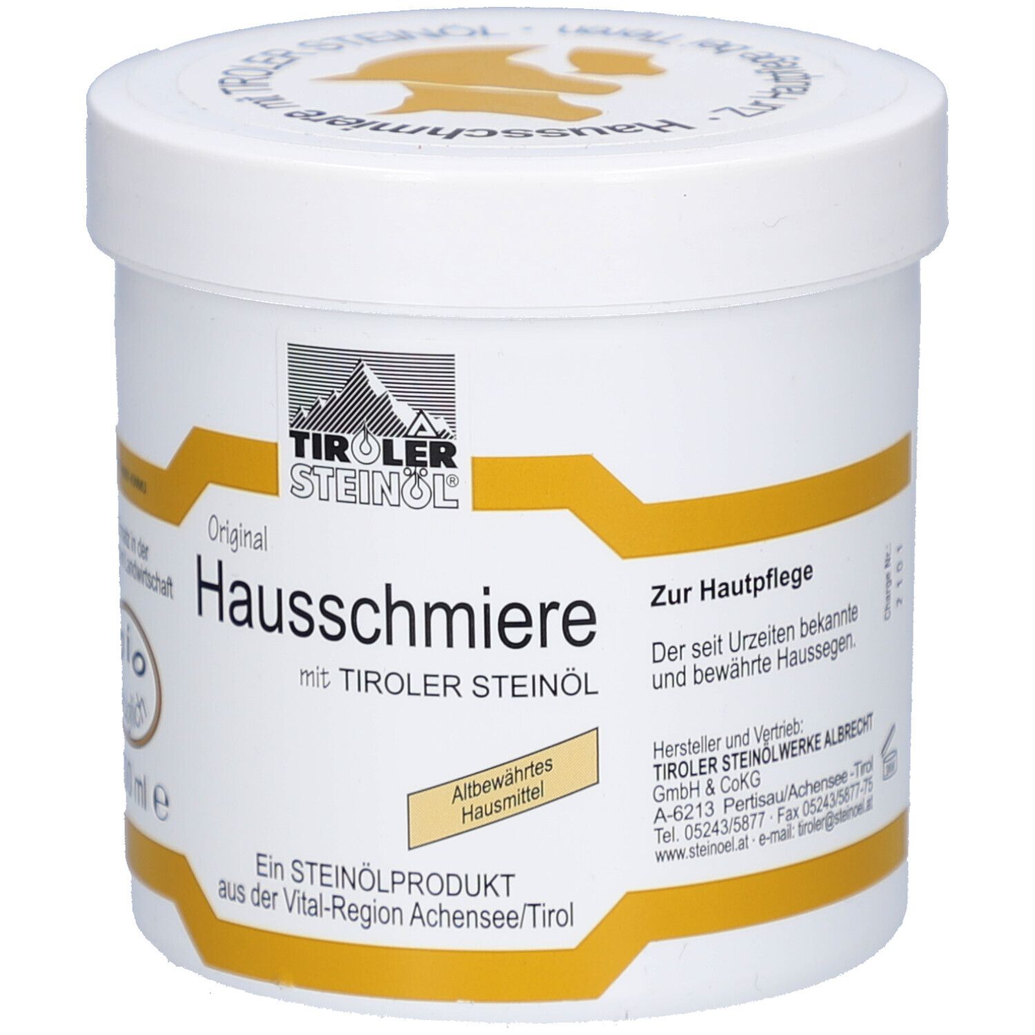 Weißer Tiegel mit gelben Akzenten. Aufschrift: TIROLER STEINÖL, Hausschmiere, Zur Hautpflege.