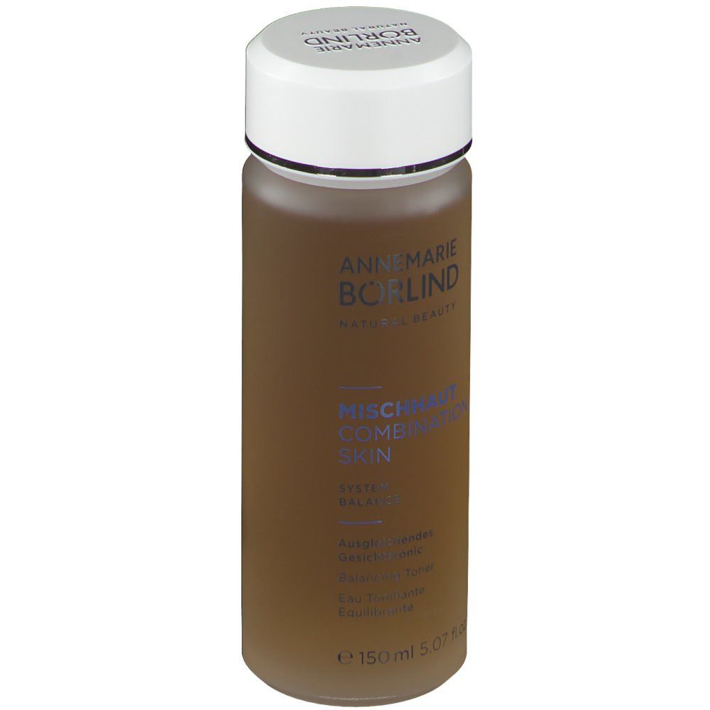 Zylindrische Flasche mit weißem Deckel. Aufschrift: ANNEMARIE BÖRLIND. Mischhaut Combination Skin. Braune Flüssigkeit.