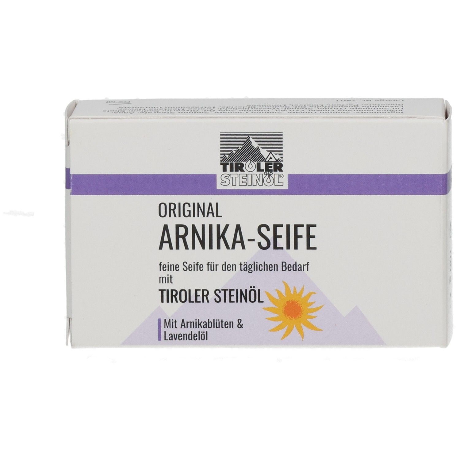 Weißer Karton mit lila Streifen. Aufschrift: ORIGINAL ARNIKA-SEIFE, TIROLER STEINOEL. Mit Arnikablüten & Lavendelöl.