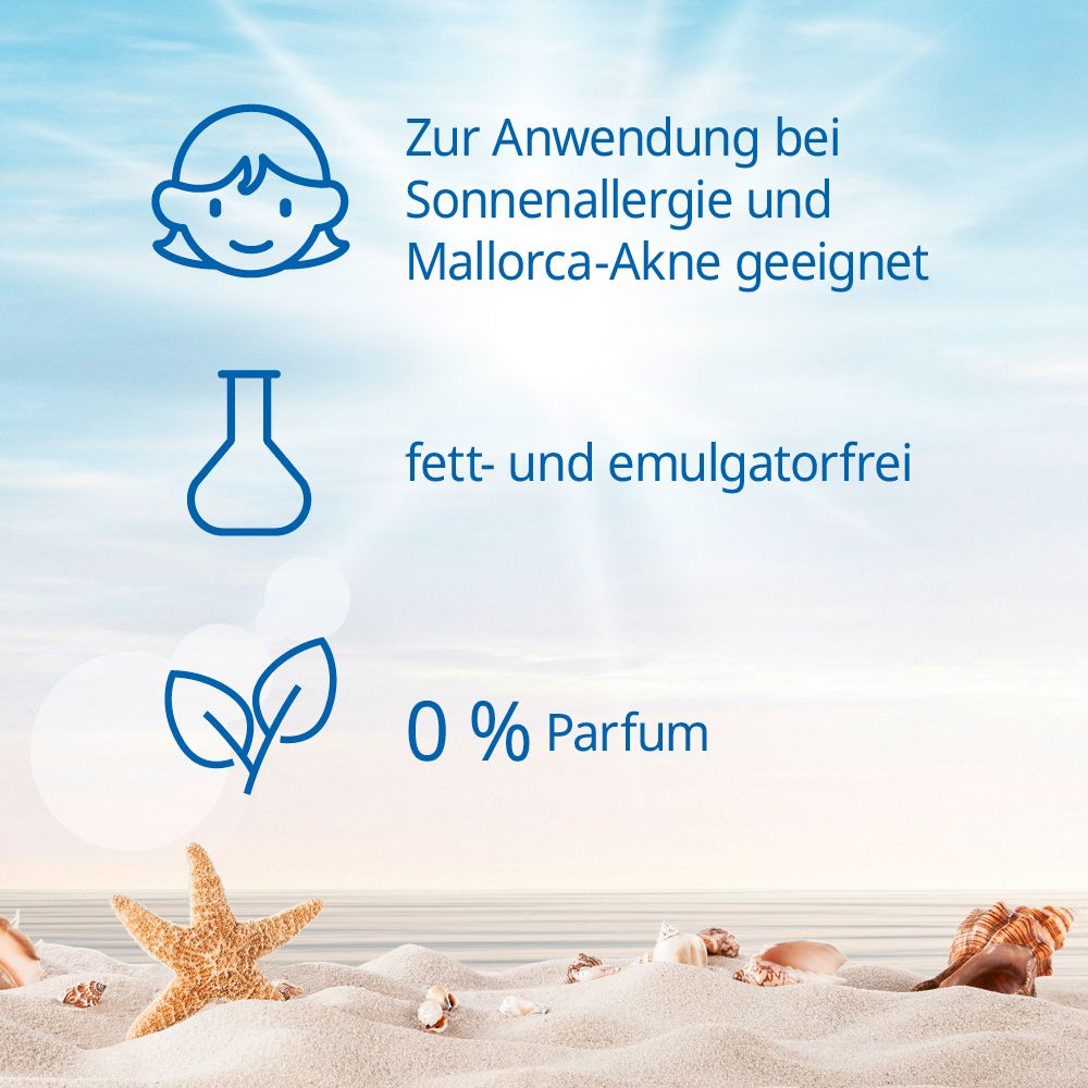 Text auf Sand. Text: Zur Anwendung bei Sonnenallergie und Mallorca-Akne geeignet, fett- und emulgatorfrei, 0% Parfum. Seestern.