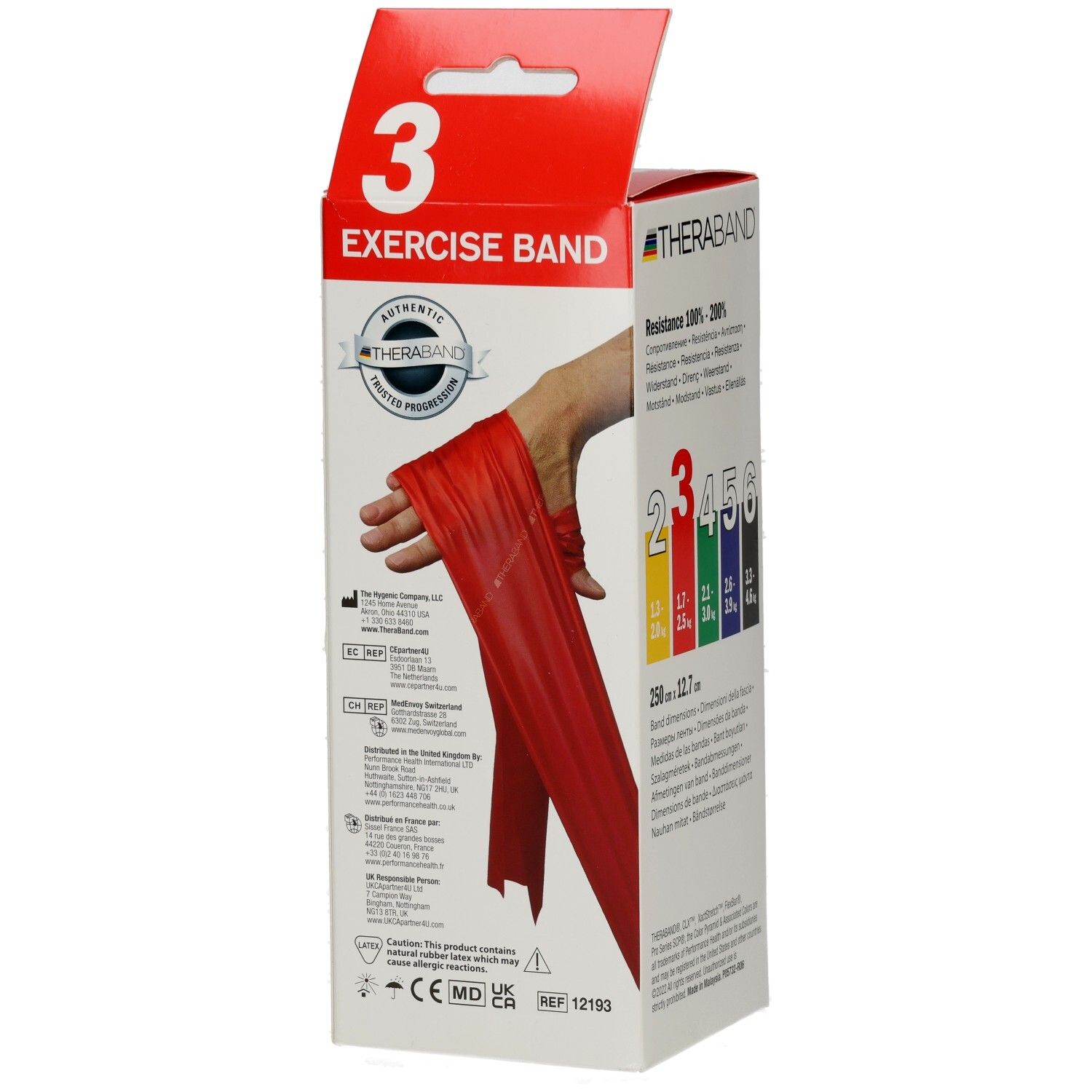 Verpackung mit Theraband. Aufdruck: Exercise Band, 3. Rotes Band in Hand. Logo Theraband. CE-Kennzeichnung.