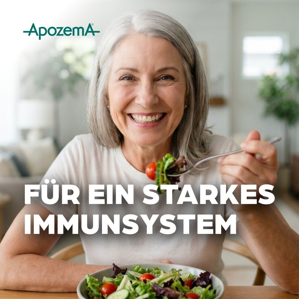 Lächelnde Frau isst Salat. Text: Für ein starkes Immunsystem.