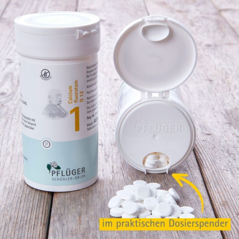 Geöffnete Tabletten-Dose mit Tabletten. Text: im praktischen Dosierspender. Pflüger Schüßler-Salze.