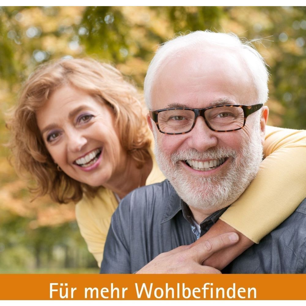 Älteres Paar lächelt. Text: Für mehr Wohlbefinden.