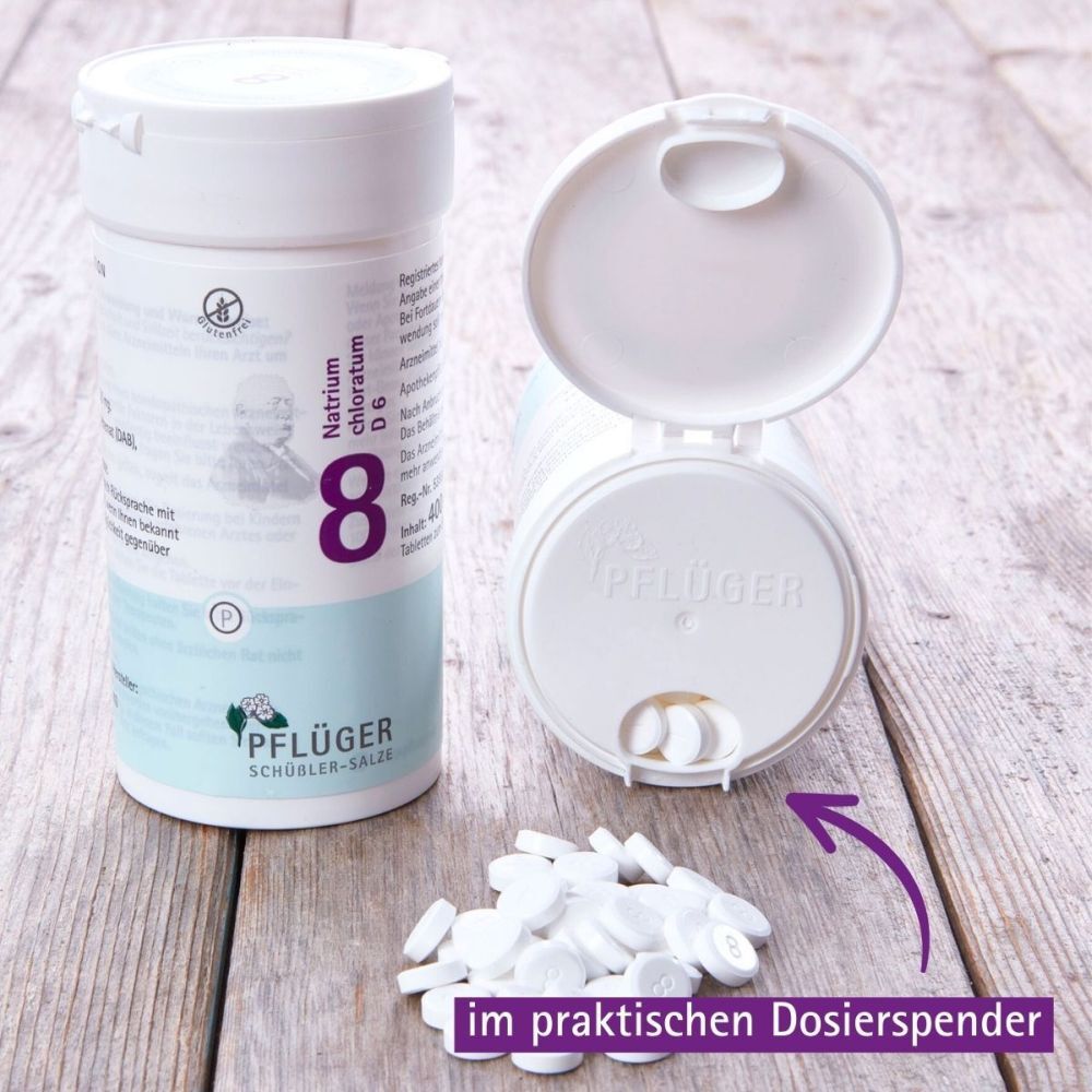 Weiße Tabletten aus einer Dose. Dose geöffnet. Text: im praktischen Dosierspender.