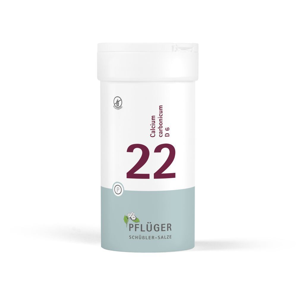 Weiße Tabletten in einer weißen Dose. Aufschrift: 22 Calcium carbonicum D6. Marke: Pflüger. Glutenfrei.