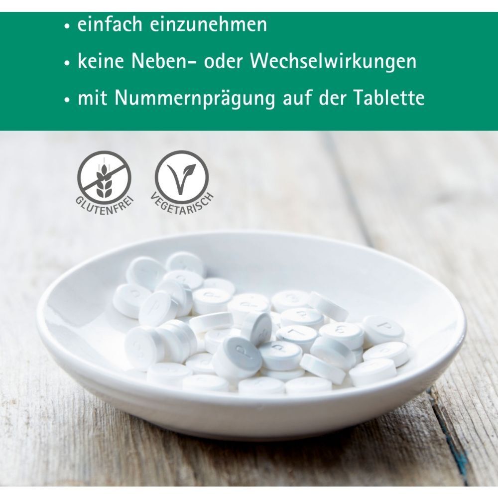 Tabletten in Schale. Text: einfach einzunehmen, keine Nebenwirkungen, mit Nummer. Glutenfrei, vegetarisch.