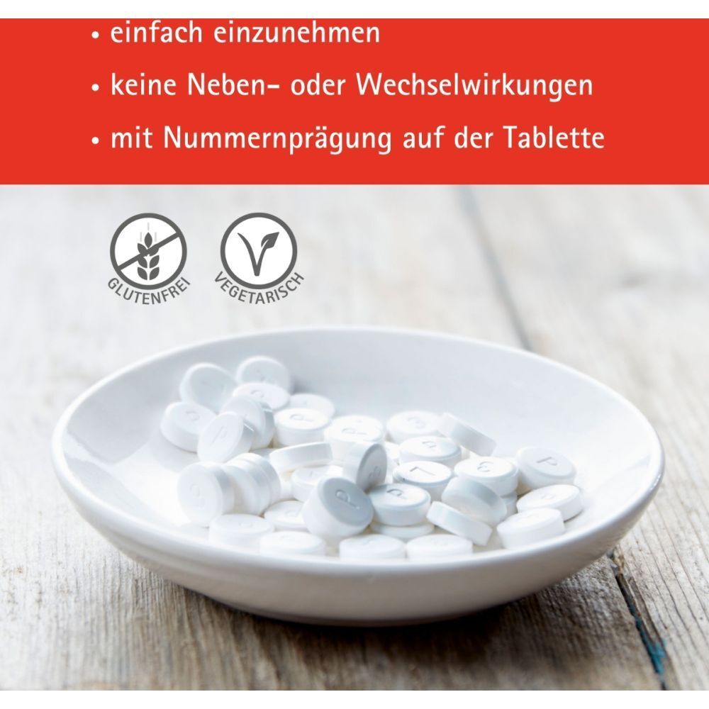 Tabletten in Schale. Symbole: glutenfrei, vegetarisch. Text: "mit Nummerprägung auf der Tablette".