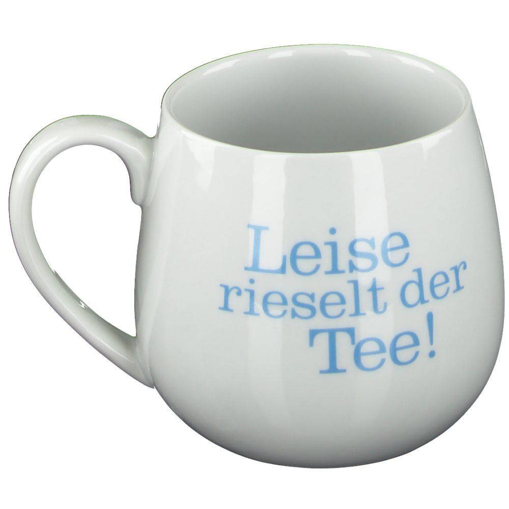 Weißer Keramikbecher mit Henkel. Auf der Seite steht in blauer Schrift "Leise rieselt der Tee!". Der Becher hat eine runde Form.