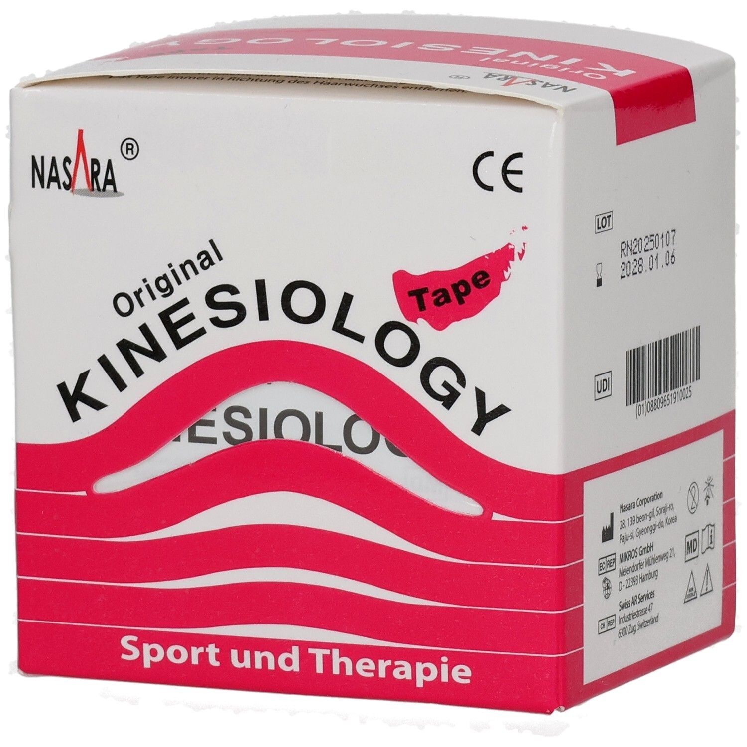 Kinesiologie-Tape-Box. Weiß mit roter Schrift und Design. Aufschrift: Original Kinesiology Tape. Sport und Therapie. CE-Zeichen.