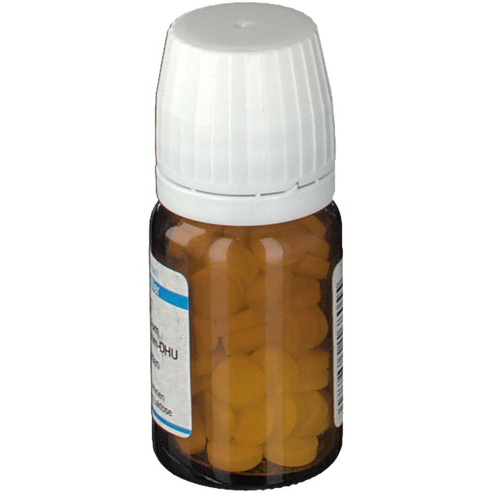 Braune Glasflasche mit weißen Tabletten. Weißer Deckel. Produkt teilweise sichtbar. Etikett mit Produktinformationen.