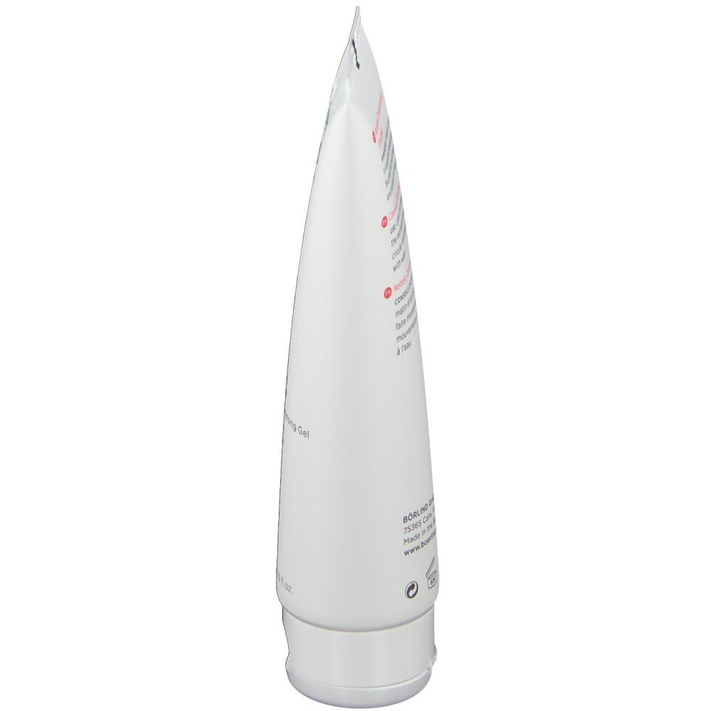 Weiße Tube, Seitenansicht. Aufschrift nicht lesbar. Unterseite mit weißem Verschluss.