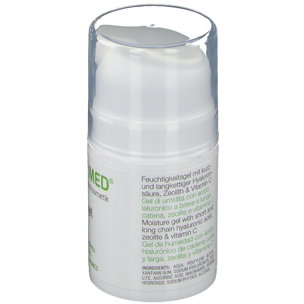 Rückseite der weißen Flasche. Beschriftung: Feuchtigkeitsgel mit Hyaluronsäure, Zeolith & Vitamin C. Mehrsprachige Inhaltsangaben.