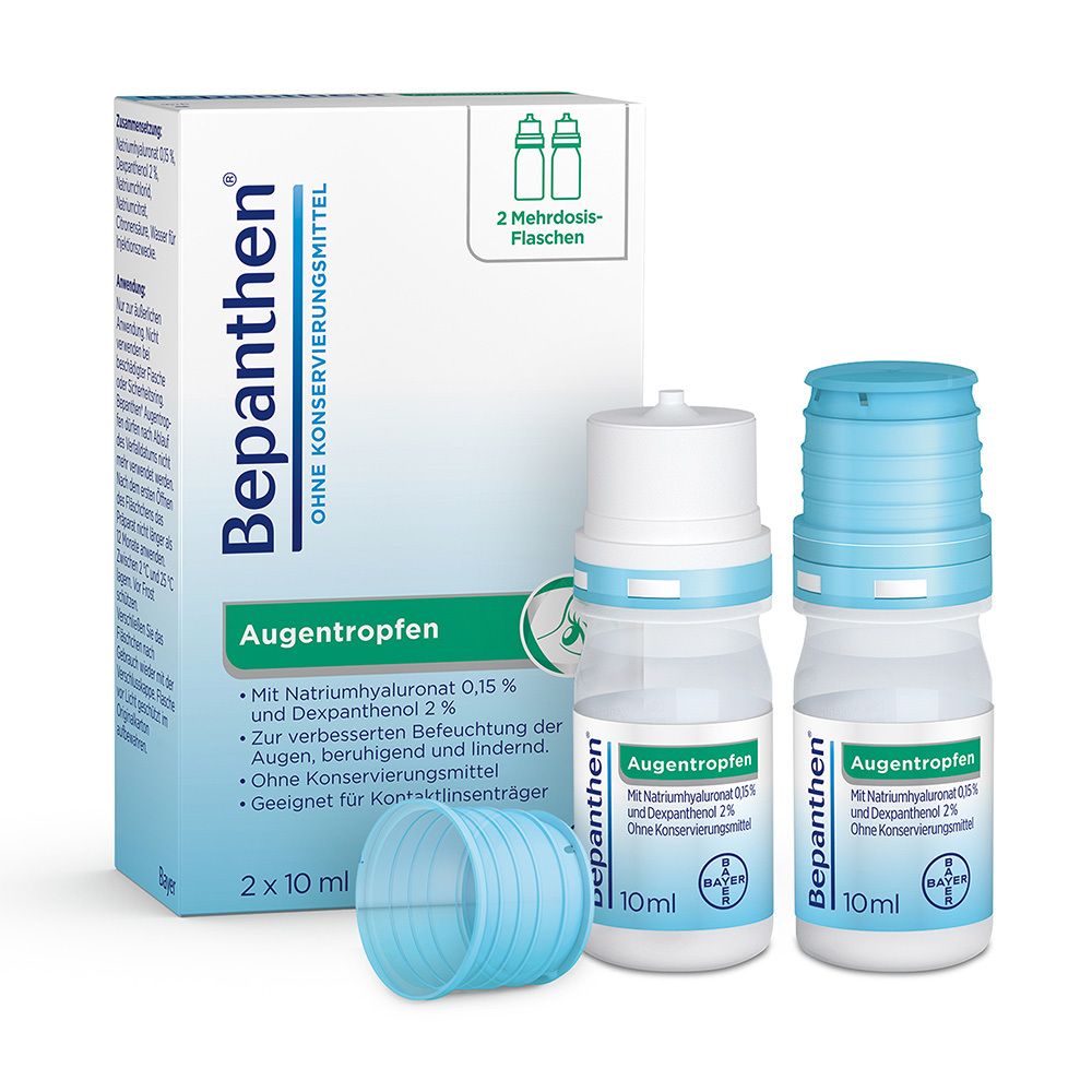 Verpackung und Flaschen von Bepanthen Augentropfen. Zwei Flaschen, eine Kappe und eine Schachtel. Ohne Konservierungsmittel.