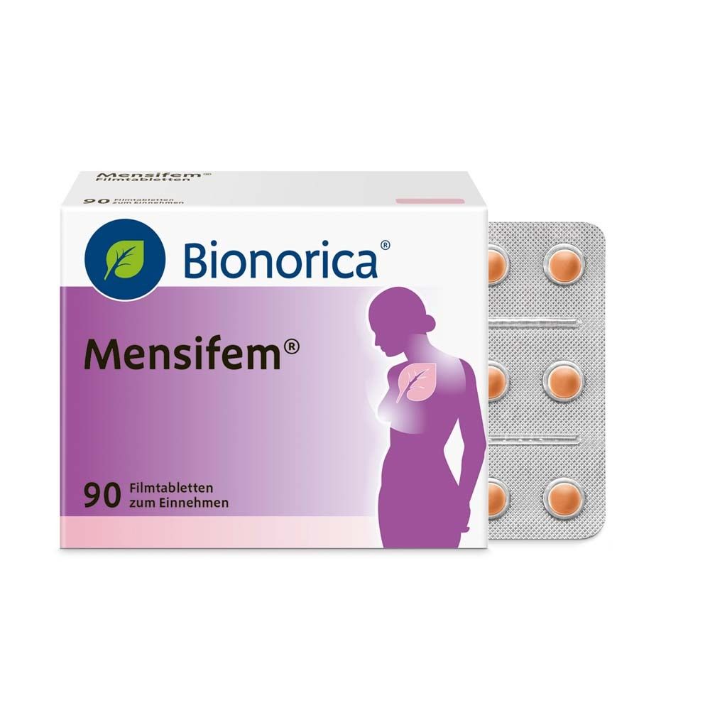 Bionorica Mensifem® Packung mit Tablettenblistern. 90 Tabletten. Frau Silhouette. Orange Tabletten.