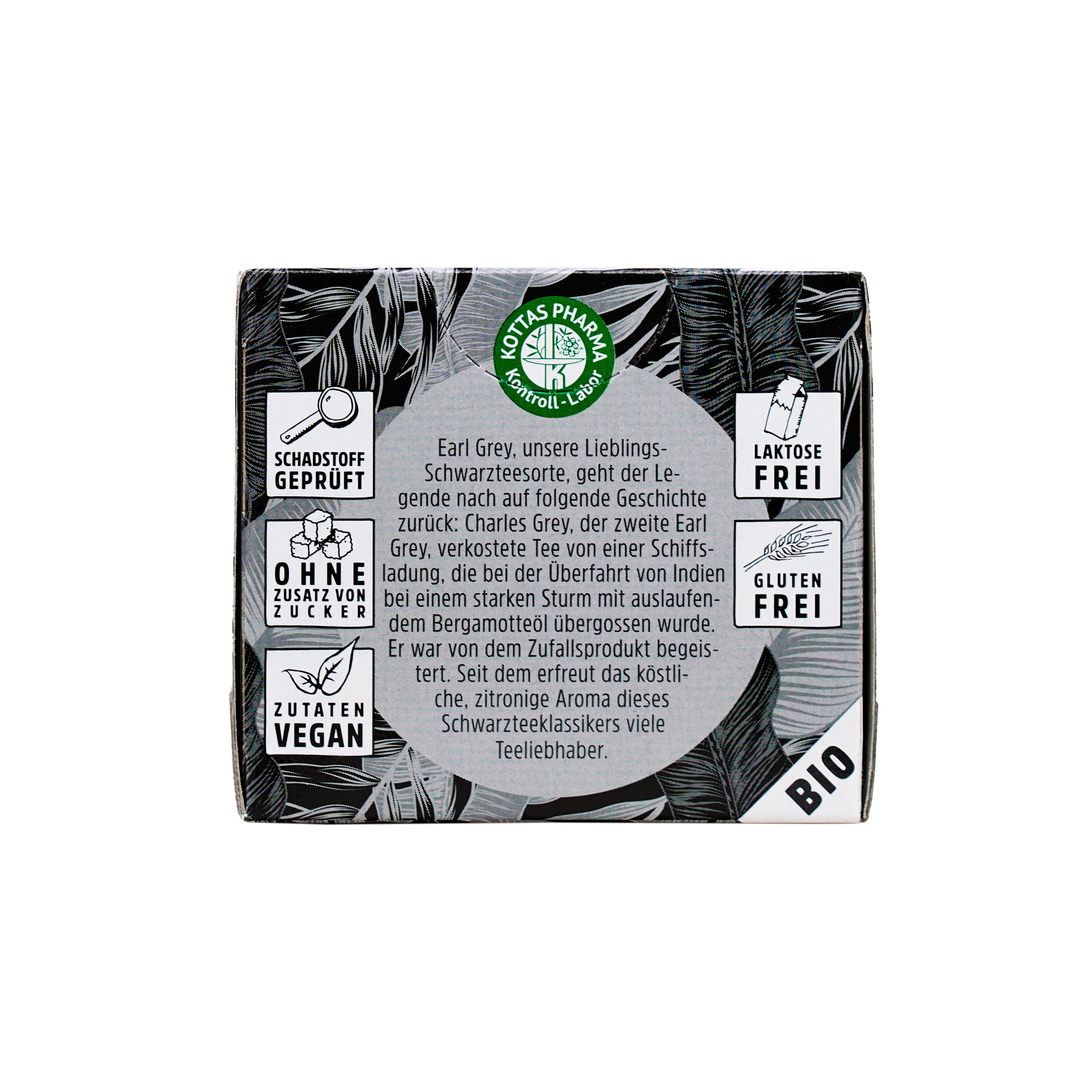 Seitenansicht einer Verpackung Dr. Kottas Earl Grey Tee. "Schadstoff geprüft", "Ohne Zusatz von Zucker", "Vegan", "Laktosefrei", "Glutenfrei".