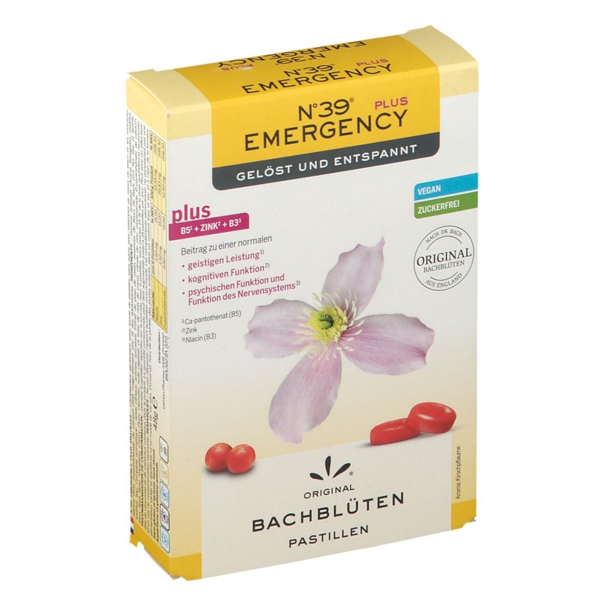 Kartonverpackung mit Pastillen. Aufschrift: N°39 EMERGENCY PLUS, ORIGINAL BACHBLÜTEN PASTILLEN. Kirschblüte-Illustration und rote Pastillen.