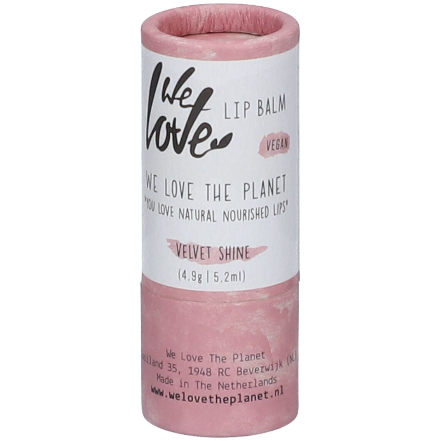 Zylindrische Lippenbalsam-Verpackung, rosa-weiß. Aufschrift: We Love, Lip Balm, Velvet Shine, Vegan. Mit Adresse und Website.