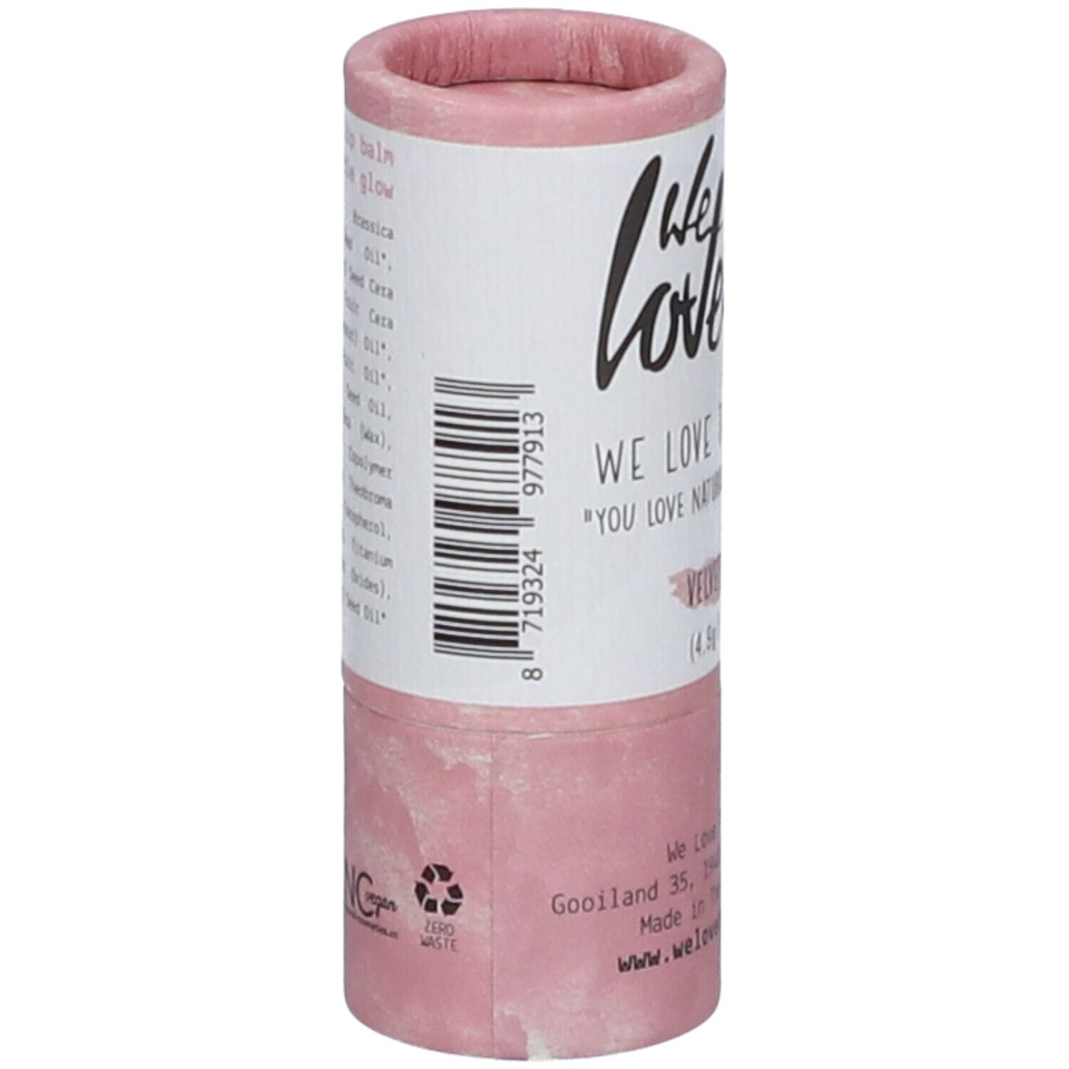 Zylindrische Lippenbalsam-Verpackung, rosa-weiß. Aufschrift: We Love, Lip Balm, Velvet Shine, Vegan. Mit Barcode und Inhaltsstoffen.