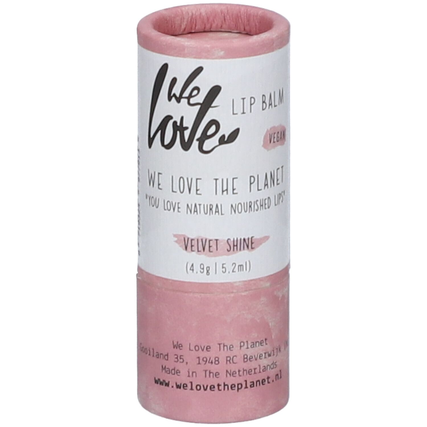 Zylindrische Lippenbalsam-Verpackung, rosa-weiß. Aufschrift: We Love, Lip Balm, Velvet Shine, Vegan. Mit Adresse und Website.