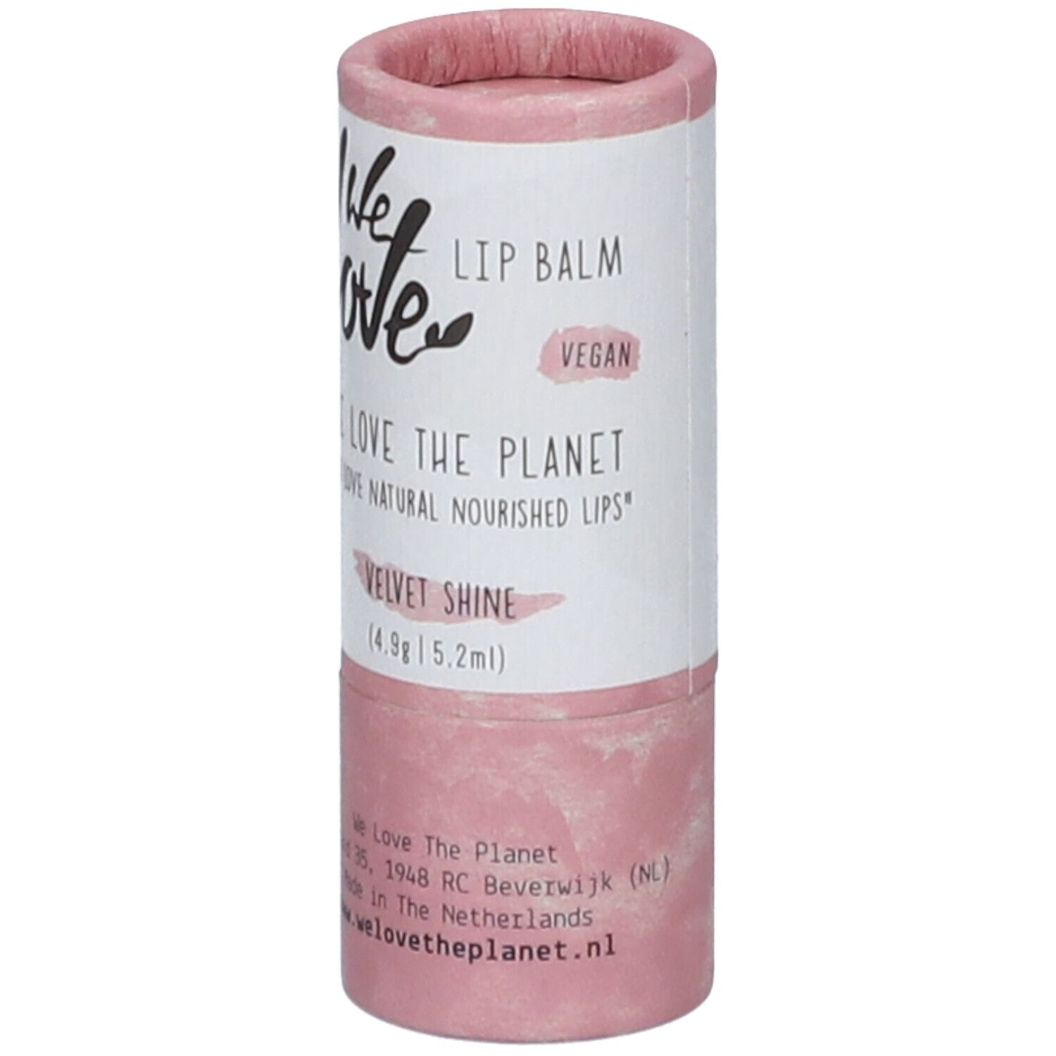 Zylindrische Lippenbalsam-Verpackung, rosa-weiß. Aufschrift: We Love, Lip Balm, Velvet Shine, Vegan. Mit Adresse und Website.