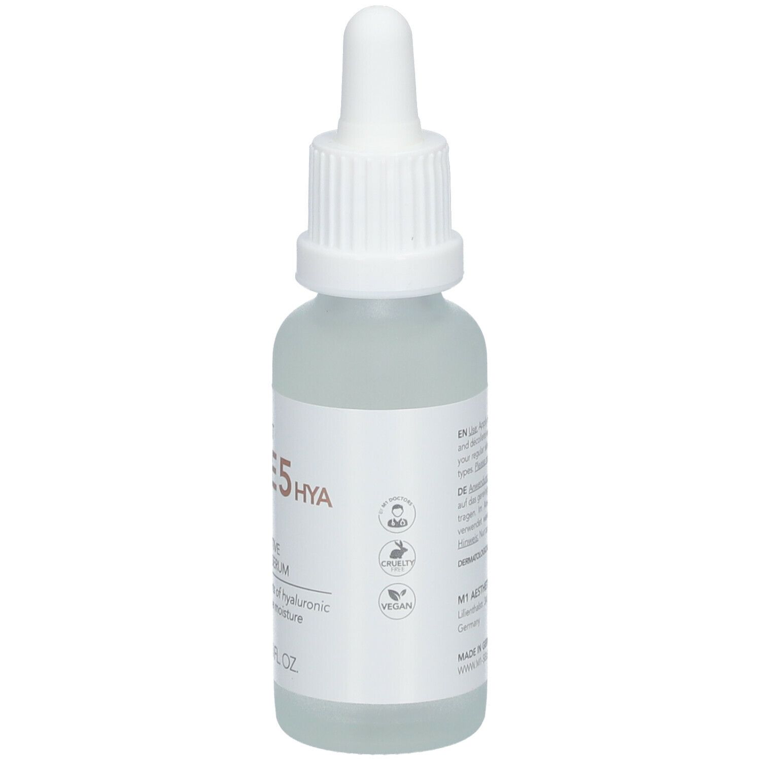 Klarflasche mit weißem Deckel und Pipette. Etikett mit Text, Symbolen und Vegan-Siegel.