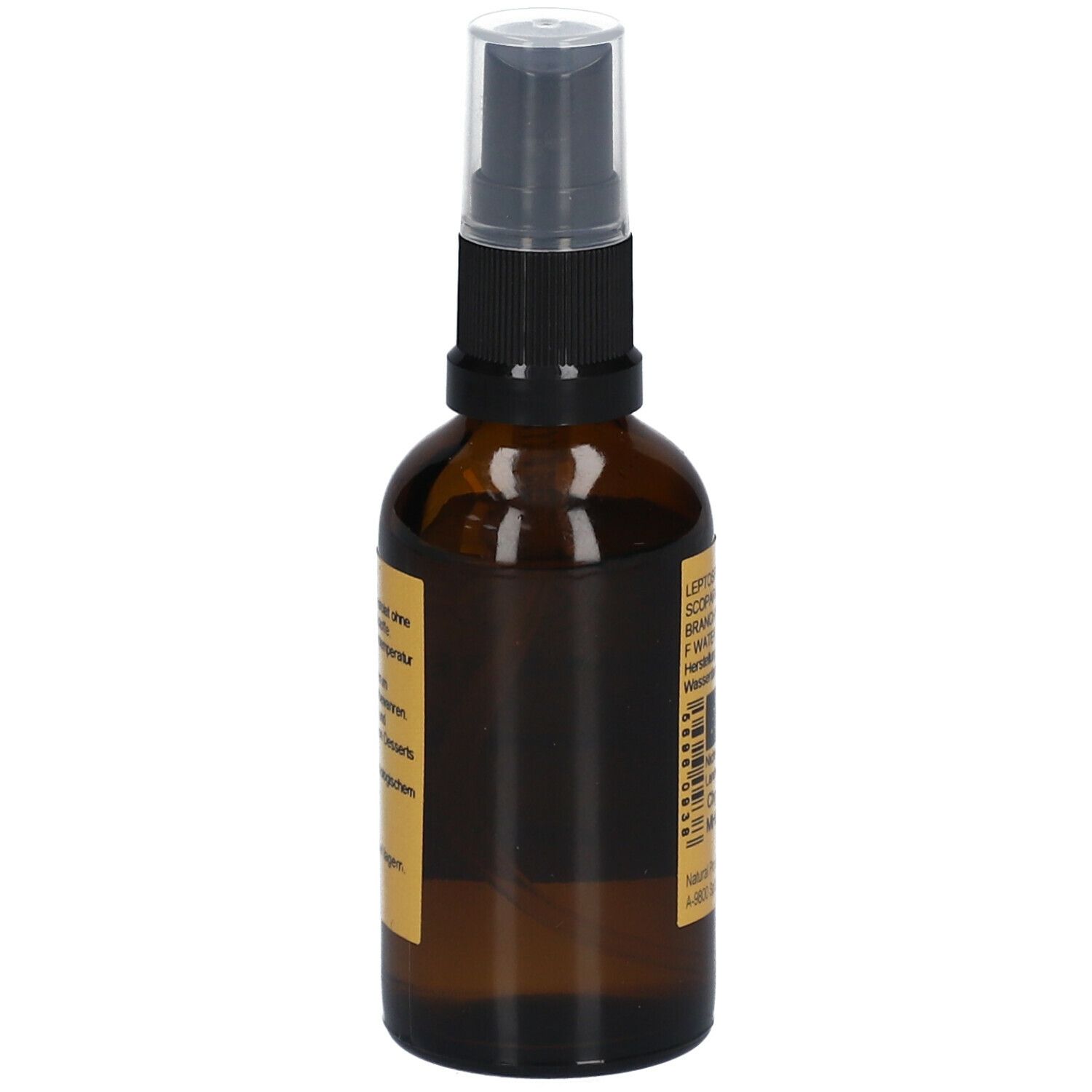 Braune Glasflasche mit Sprühkopf. Etikett mit Text. Aufschrift: PRIMABENE Manukawasser BIO.