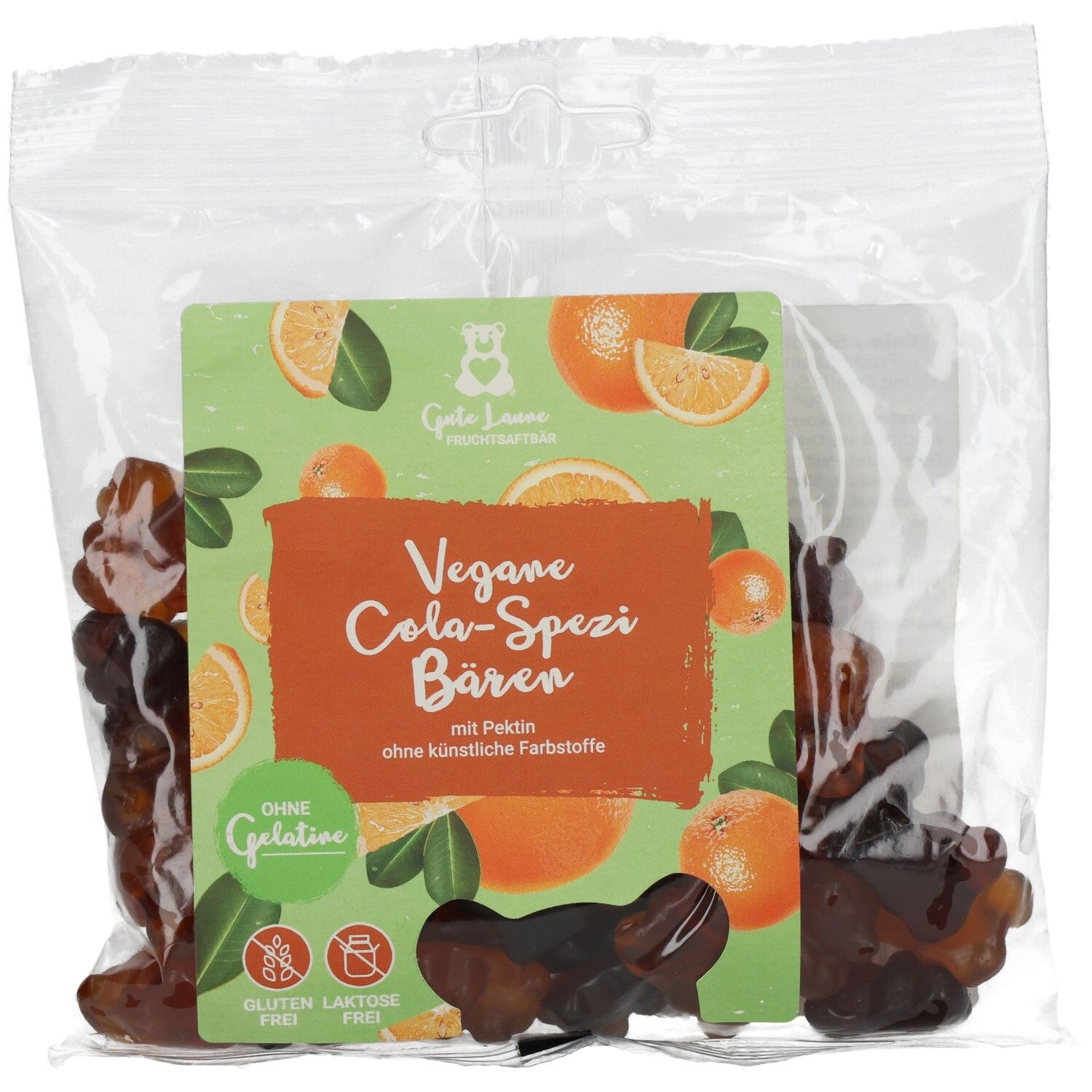 Transparente Tüte mit Fruchtgummi-Bären. Aufdruck: Vegane Cola-Spezi Bären, mit Fruchtsaftkonzentraten.