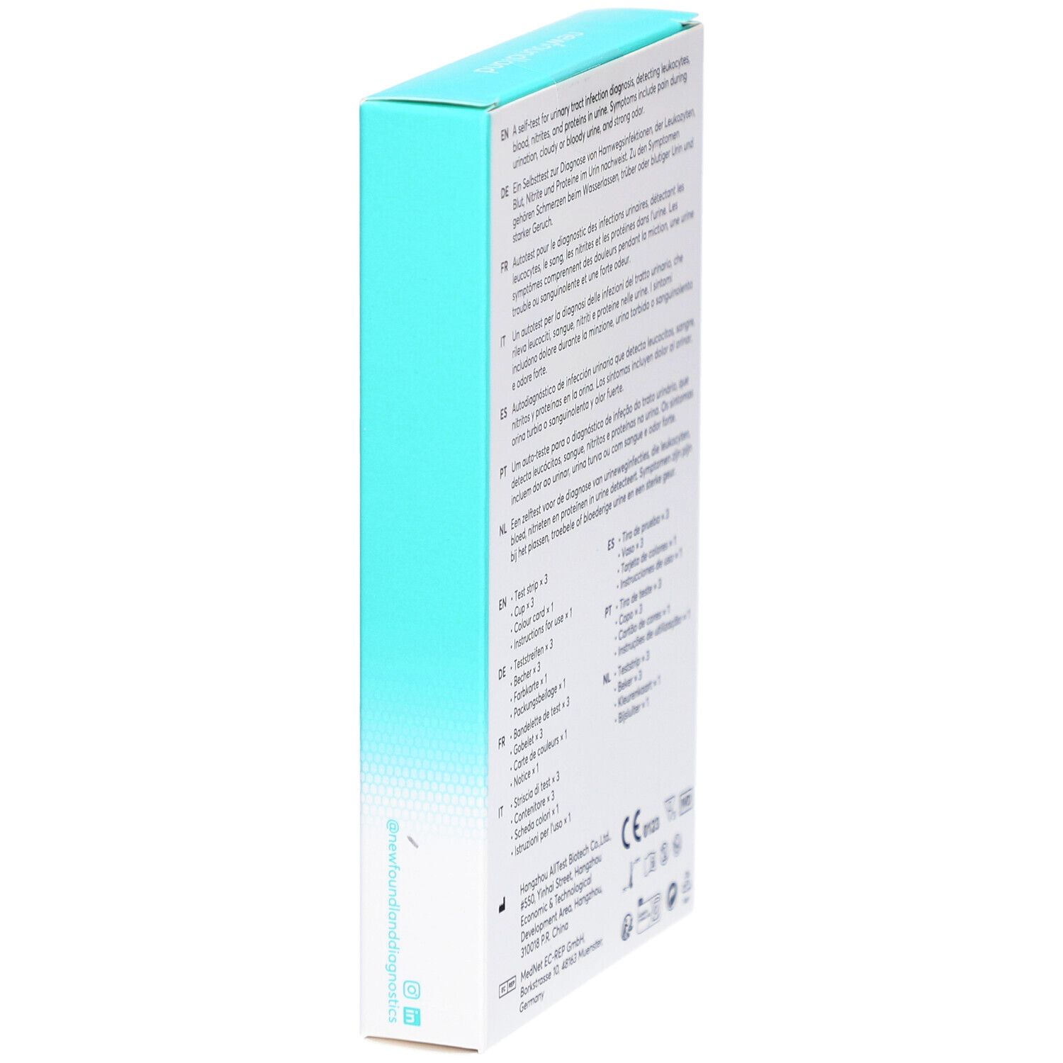 Seite der hellblauen Schachtel. Text in mehreren Sprachen. Auflistung der Testkomponenten und Herstellerinformationen.