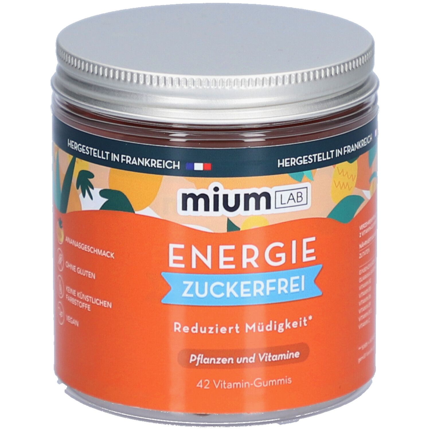 Zylindrisches Glas mit silbernem Deckel. Aufschrift: miumLAB Energie Zuckerfrei. Orangefarbener Hintergrund mit Text und Illustrationen.