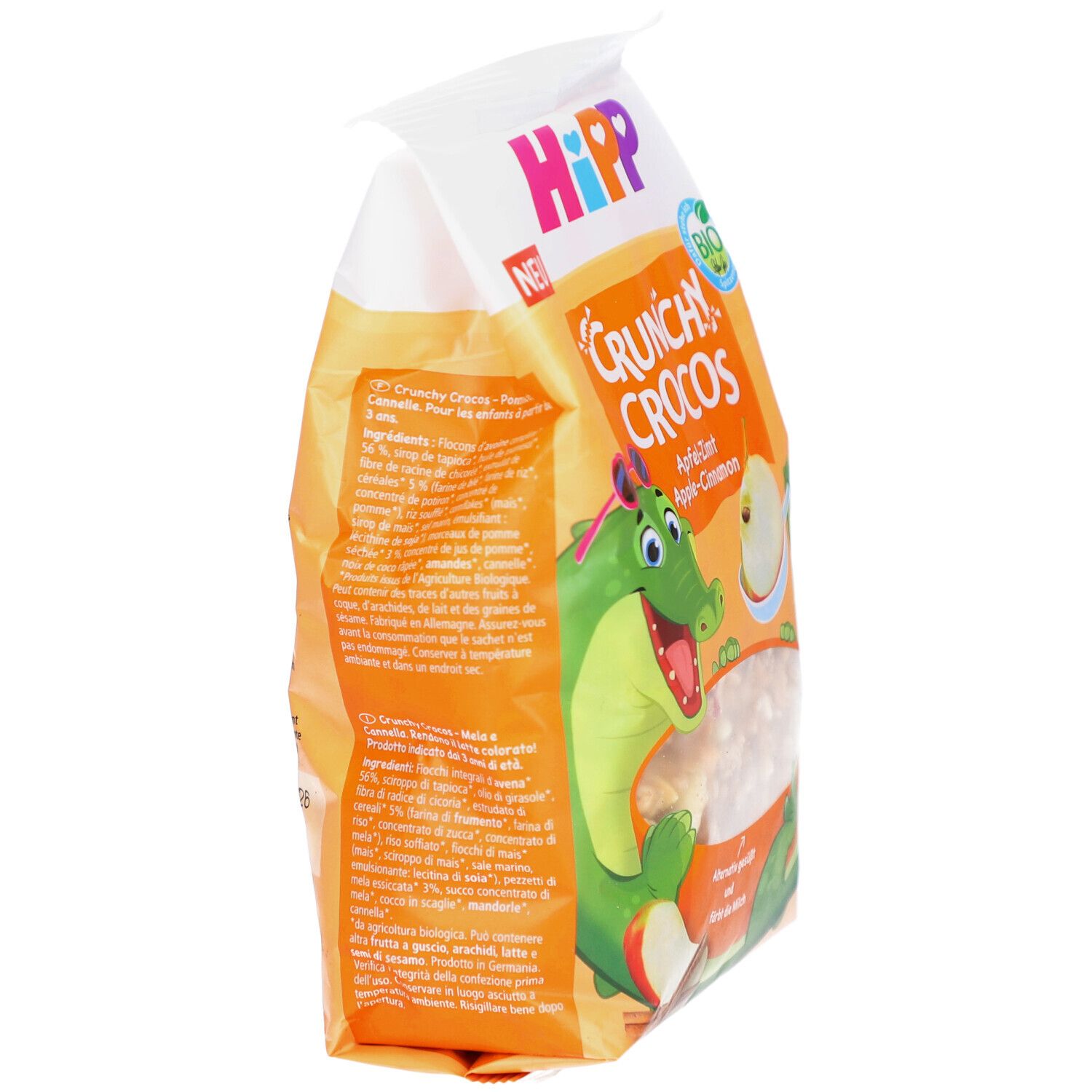 HIPP Crunchy Crocos Apfel-Zimt Verpackung, Seitenansicht. Text und Illustrationen auf orangefarbenem Hintergrund.
