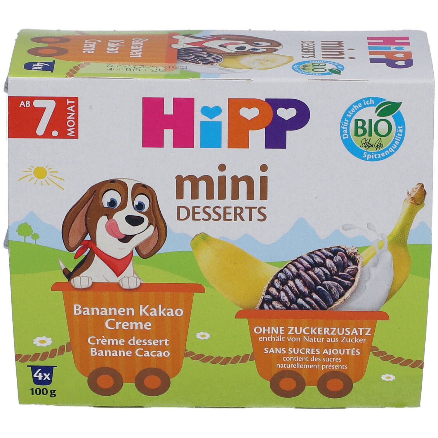 HIPP Mini Desserts Verpackung. Enthält 4 Becher Bananen-Kakao Creme. Bio-Siegel und Cartoon-Illustration.
