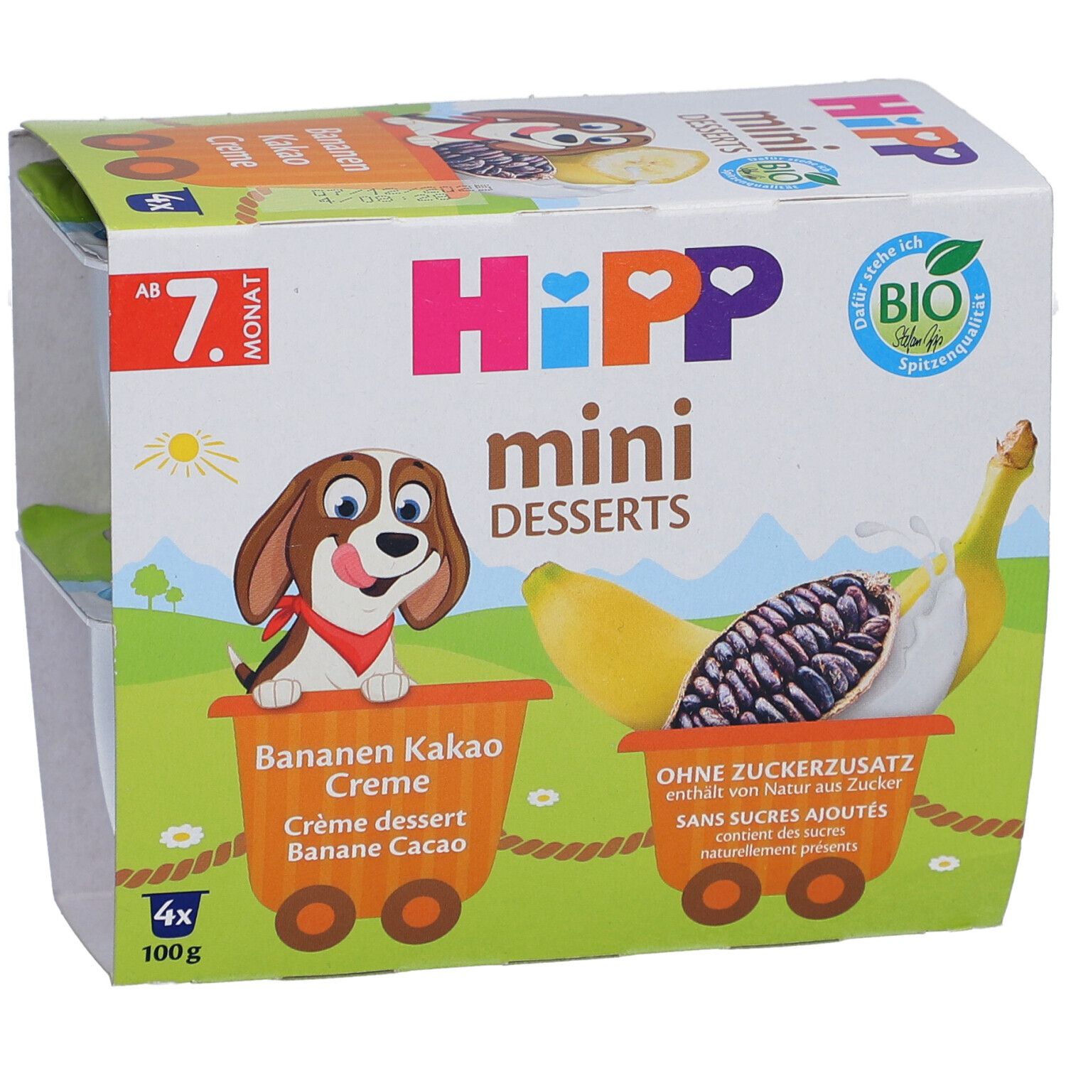 HIPP Mini Desserts Verpackung. Enthält 4 Becher Bananen-Kakao Creme. Bio-Siegel und Cartoon-Illustration.