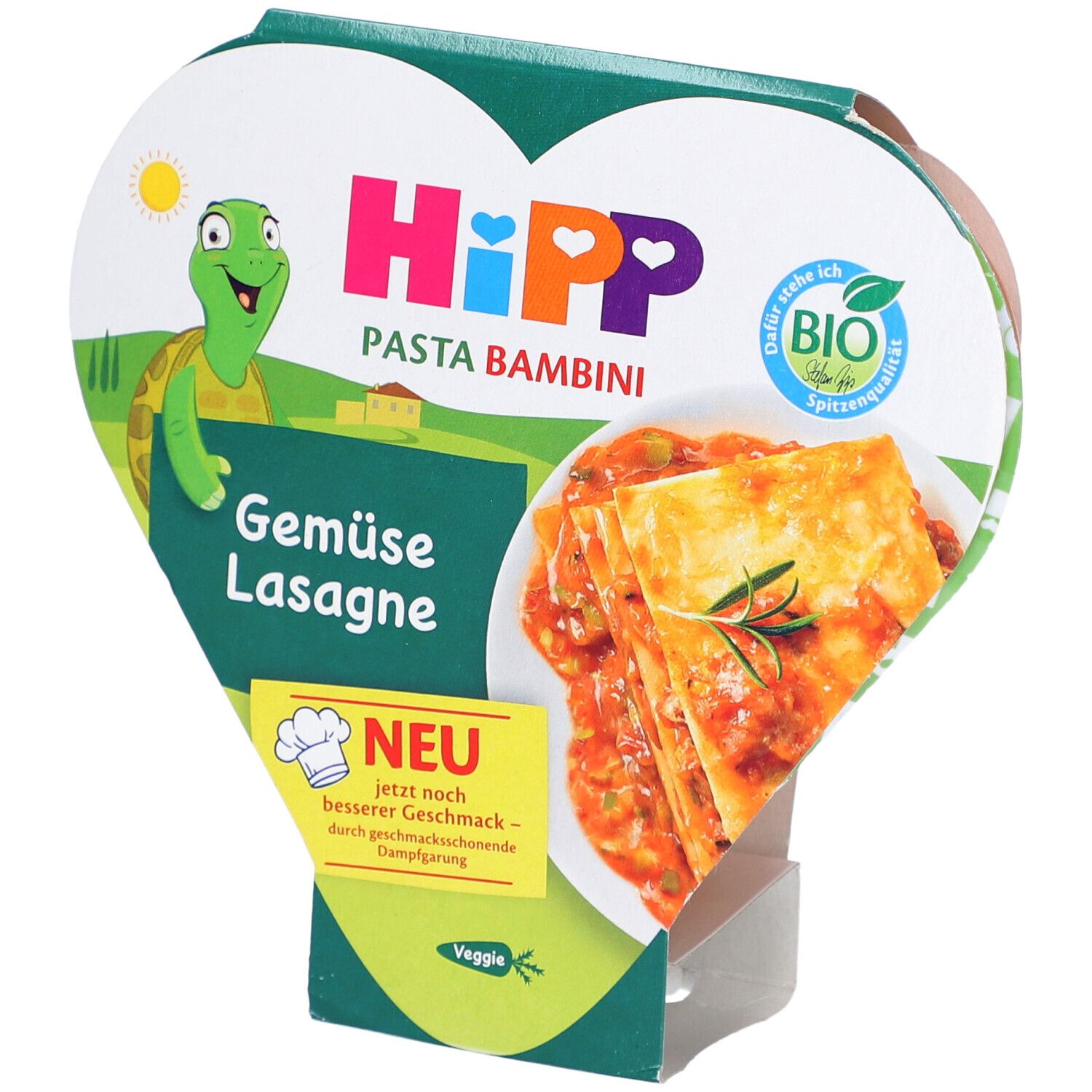 Verpackung mit HIPP Pasta Bambini Gemüse Lasagne. Herzförmige Verpackung mit Logo, Bio-Siegel und Abbildung des Gerichts.