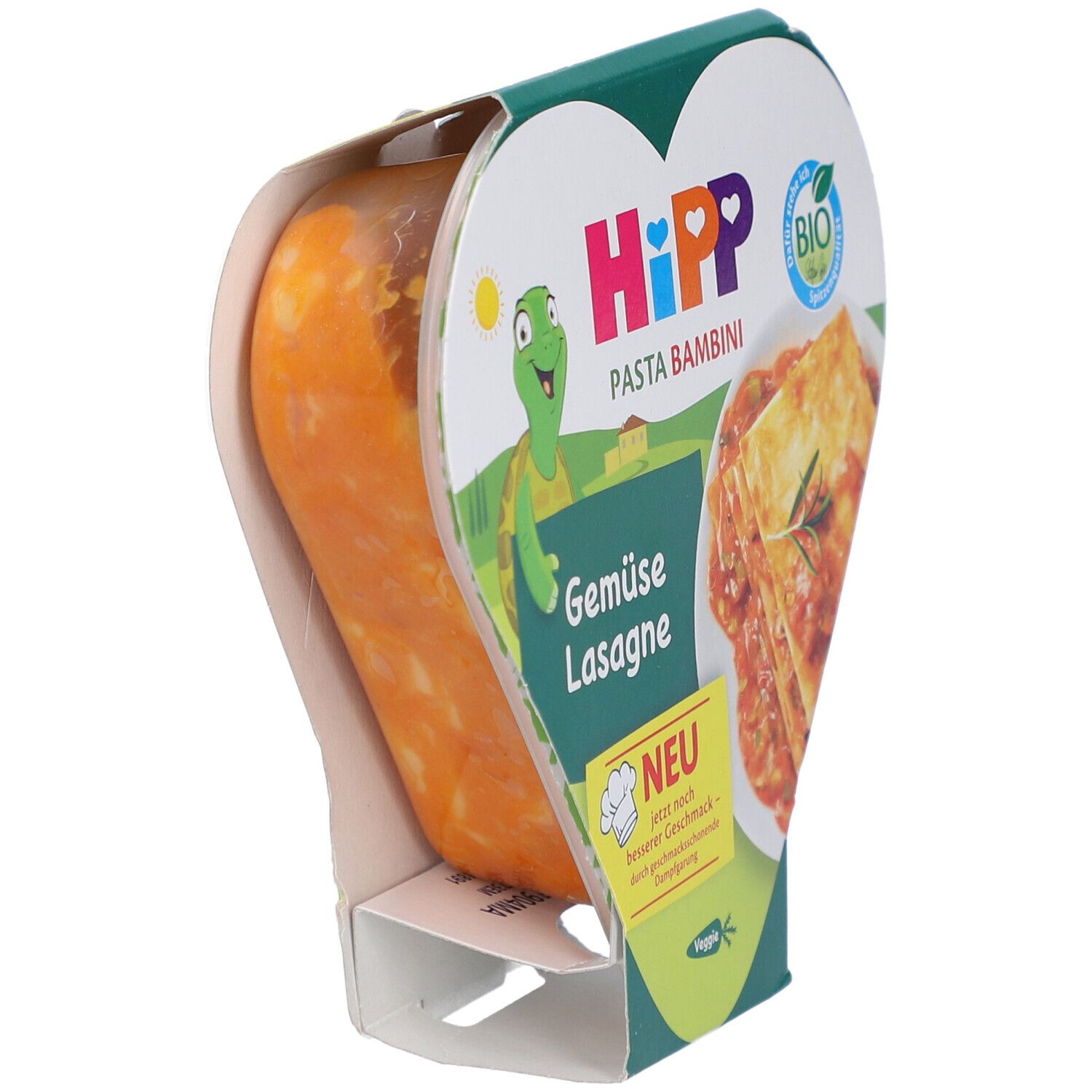 HIPP Pasta Bambini Gemüse Lasagne in herzförmiger Verpackung. Gericht sichtbar, orangefarben, in durchsichtiger Verpackung.