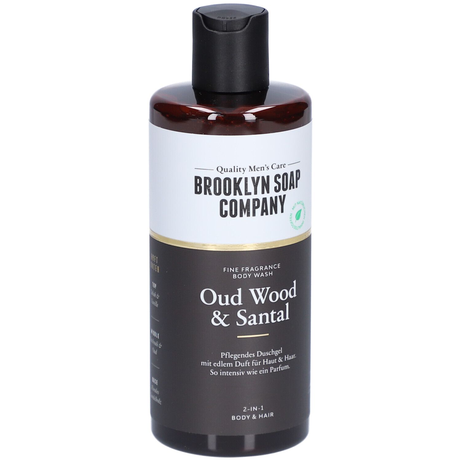 Braune Flasche mit schwarzem Deckel. Aufschrift: Brooklyn Soap Company, Oud Wood & Santal. 2-in-1 Body & Hair.