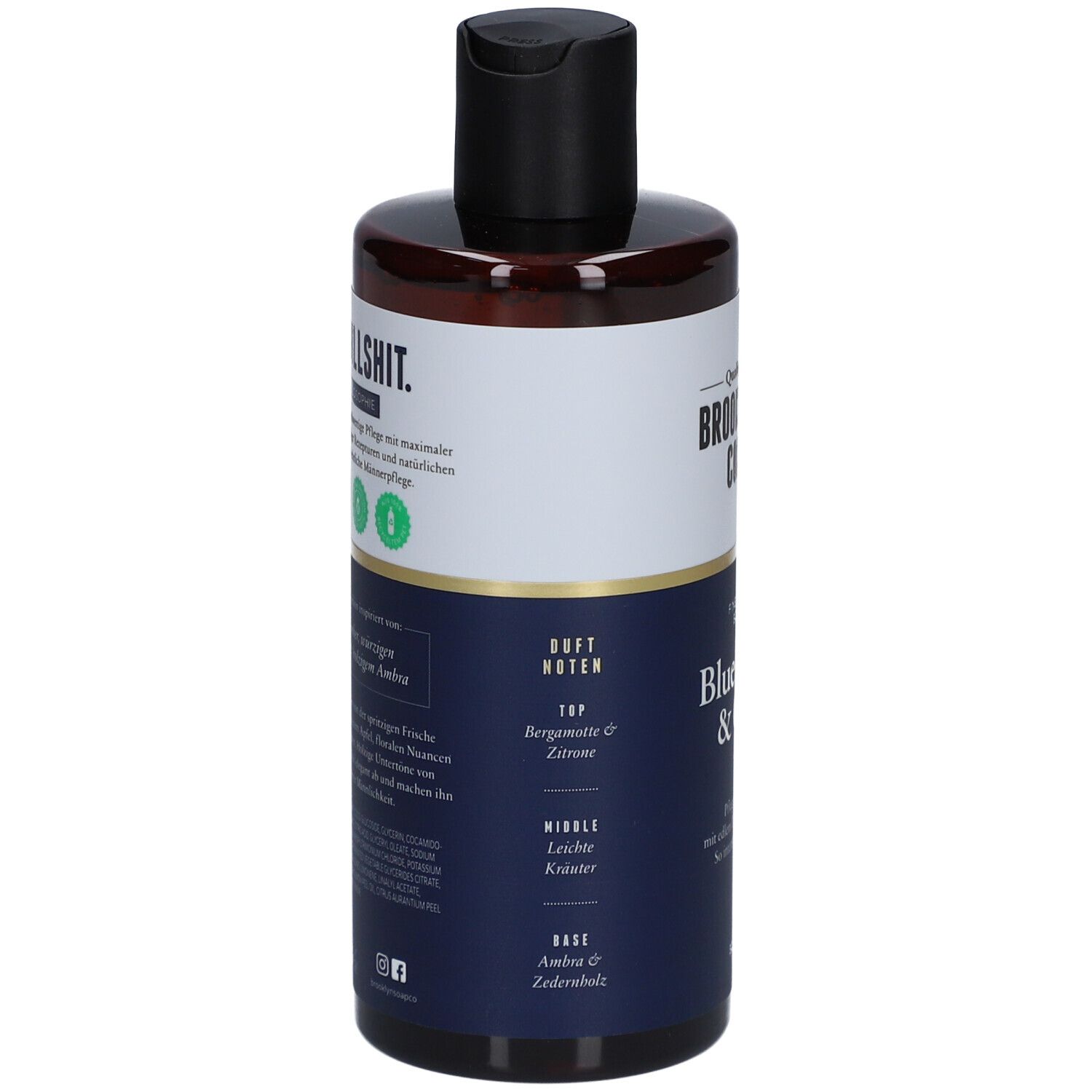 Duschgel-Flasche mit schwarzem Deckel. Aufschrift: Brooklyn Soap Company. Inhaltsstoffe: Bergamotte, Zitrone, Kräuter, Amber, Zedernholz.