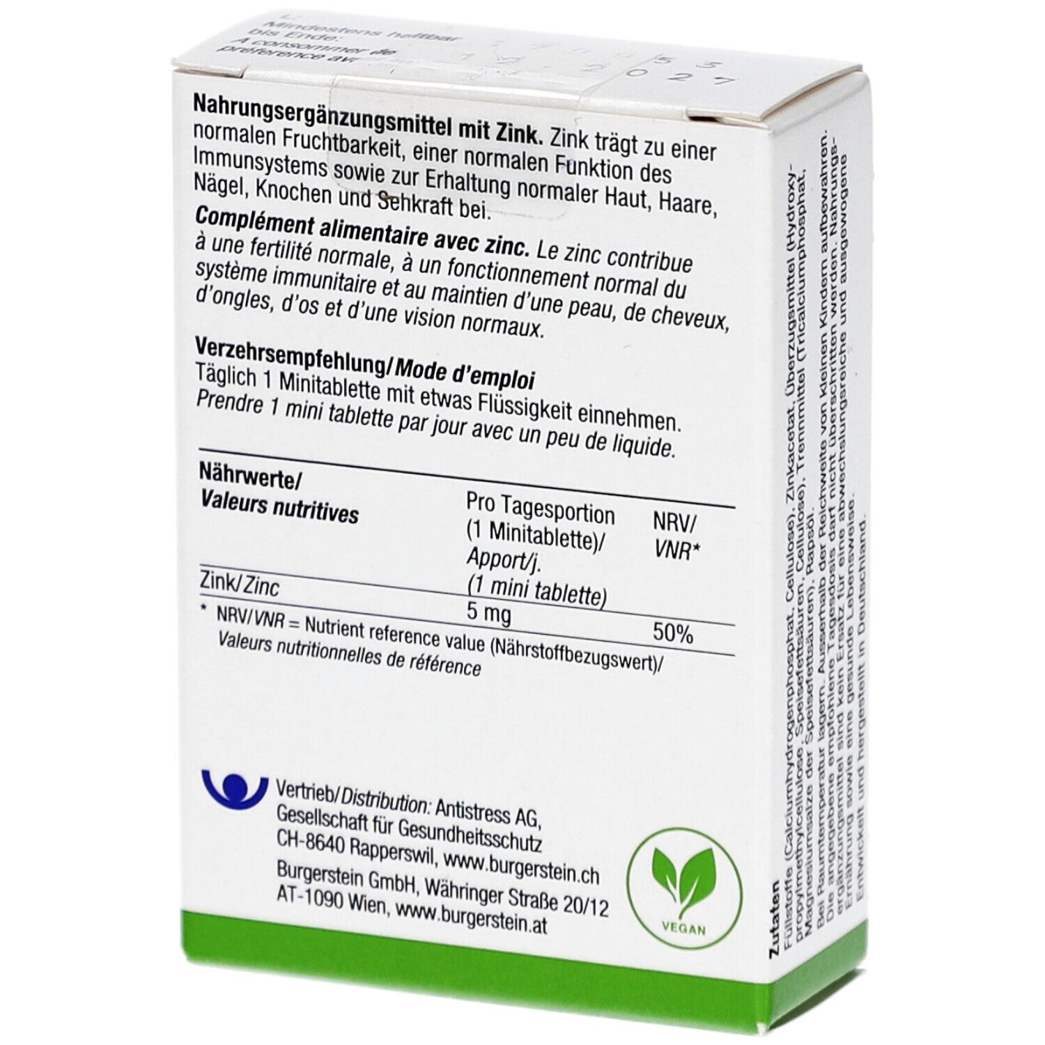 Rückseite der Schachtel. Informationen zu Zink, Dosierung und Nährwerten. Grün-weiße Verpackung.