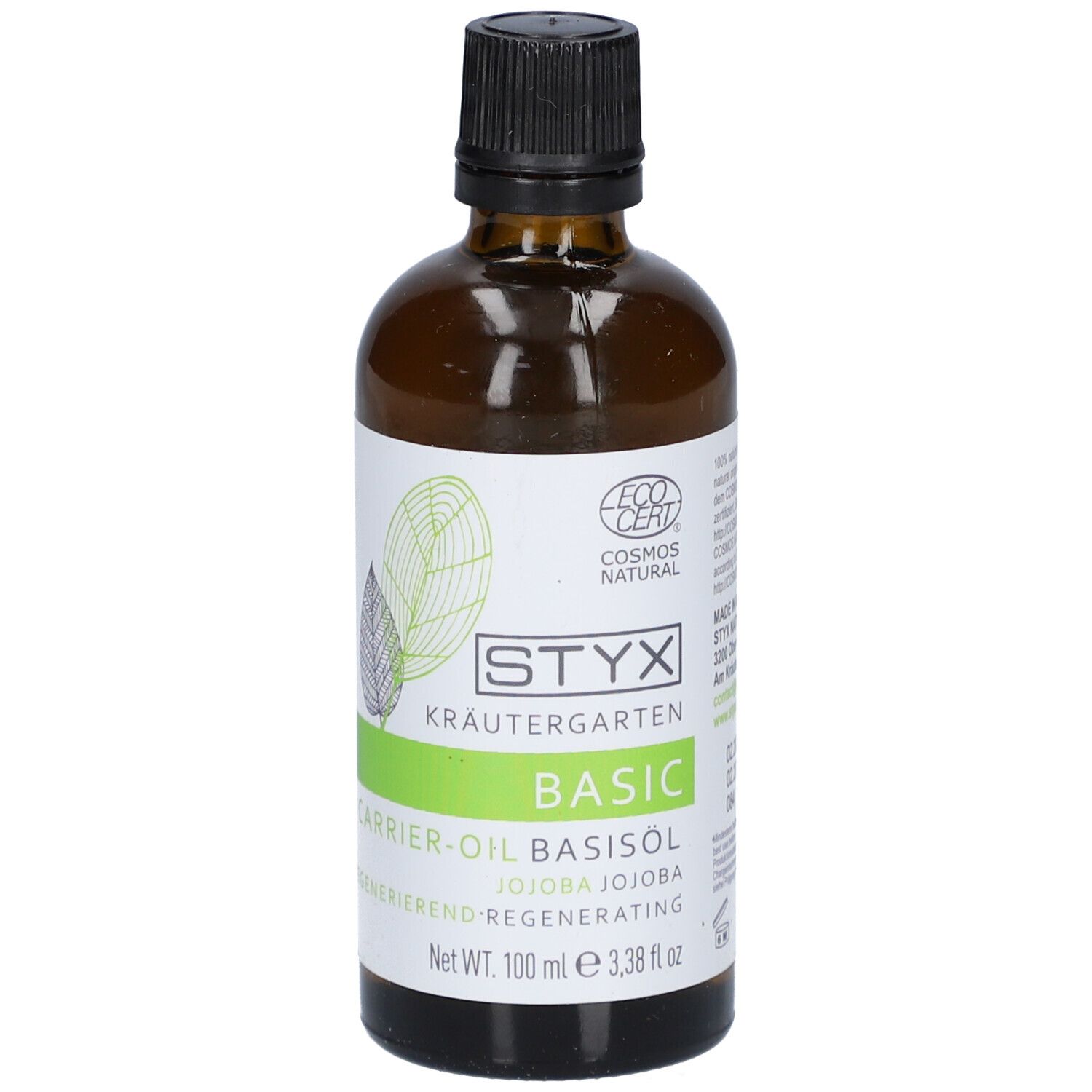 Braune Glasflasche mit schwarzem Deckel. Etikett mit STYX Kräutergarten, BASIC, Jojoba-Öl und Cosmos Natural-Zertifizierung.
