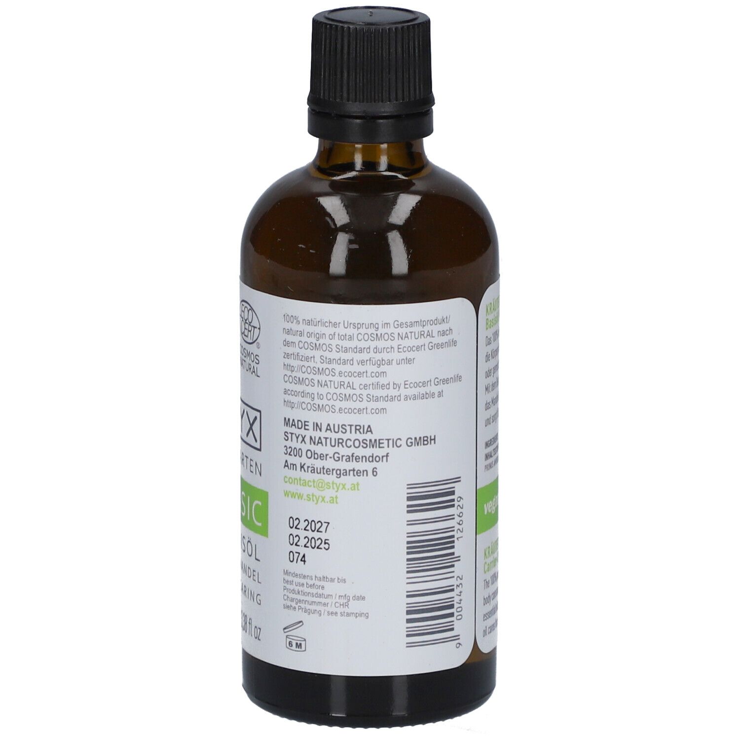 Braune Glasflasche mit schwarzem Deckel. Etikett mit STYX Kräutergarten Basic, COSMOS NATURAL Zertifizierung. Text: Basisöl Mandel, vegan.