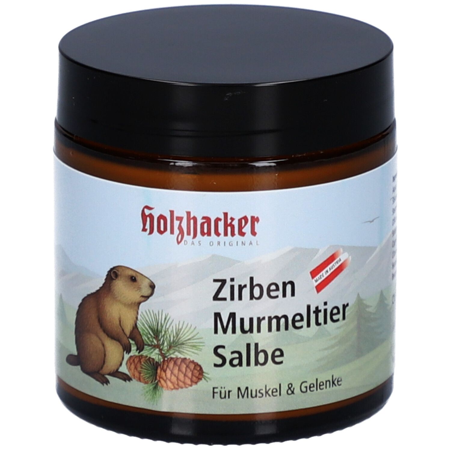 Braunes Glas mit schwarzem Deckel. Aufkleber mit Murmeltier-Illustration und Text: Zirben Murmeltier Salbe.