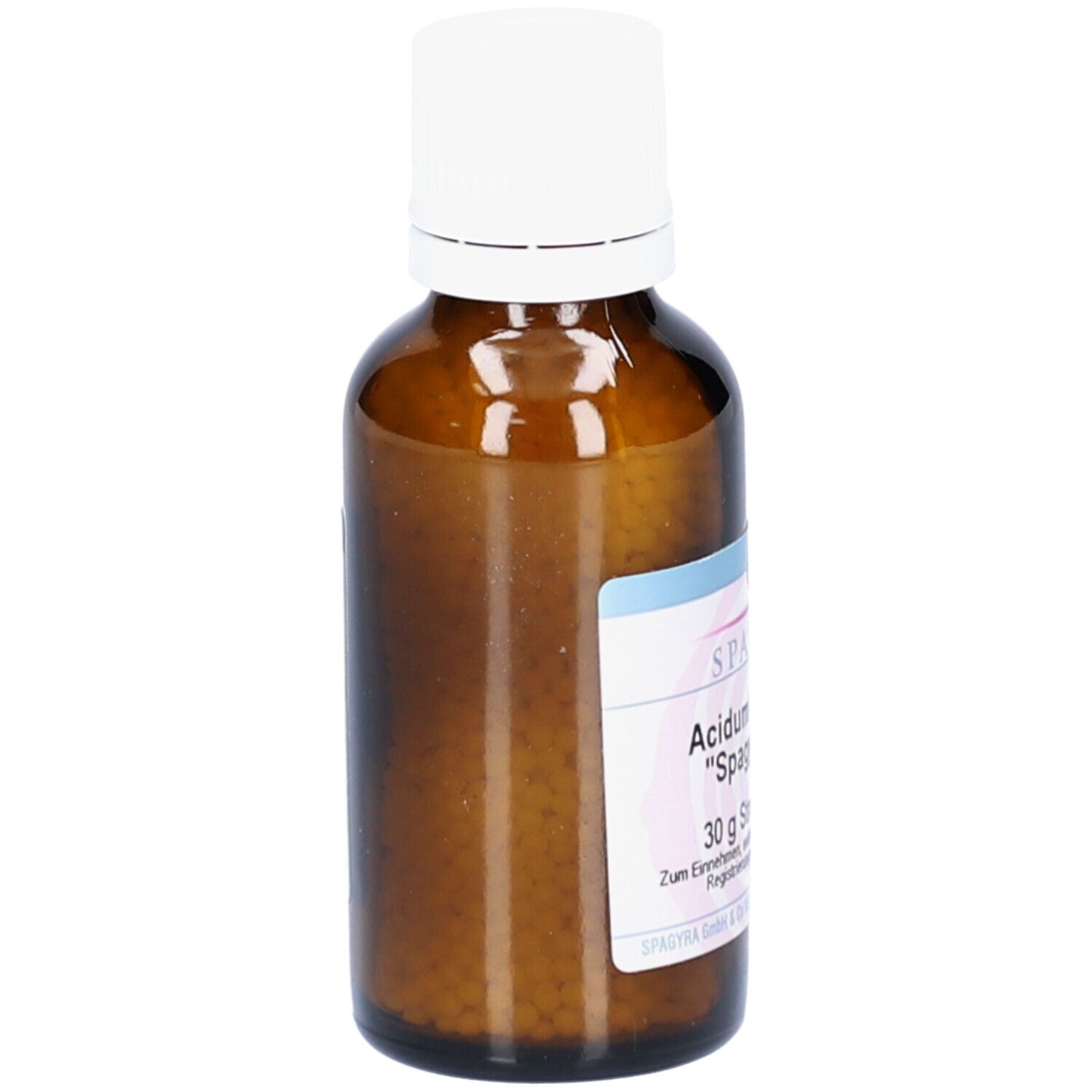 Braune Glasflasche mit weißem Deckel. Etikett mit Produktnamen und Marke SPAGYRA. Seitenansicht.