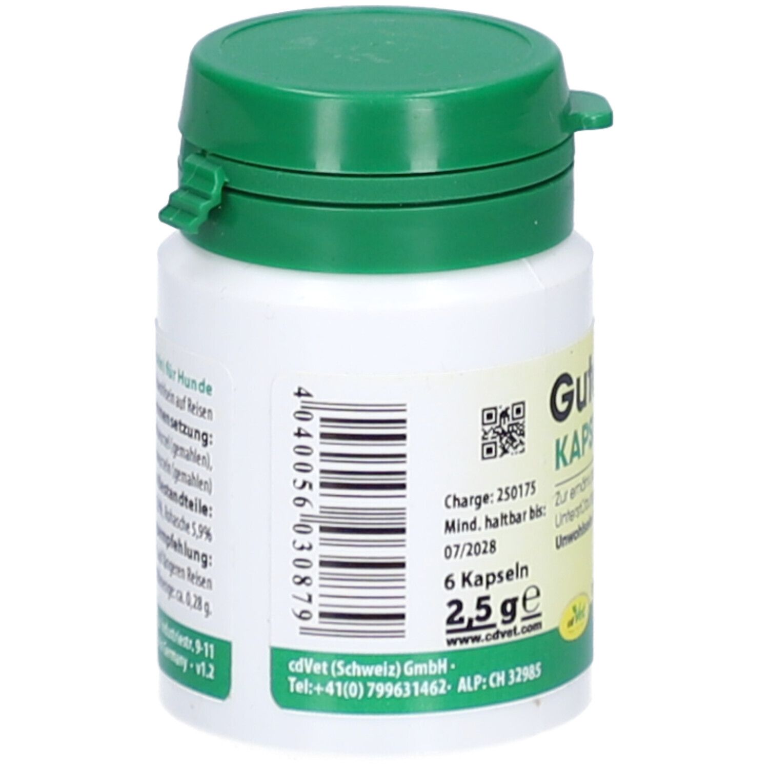 Weiße Dose mit grünem Deckel. Barcode und Text auf der Rückseite. Aufschrift: Gute Reise Kapseln. 6 Kapseln, 2,5 g.