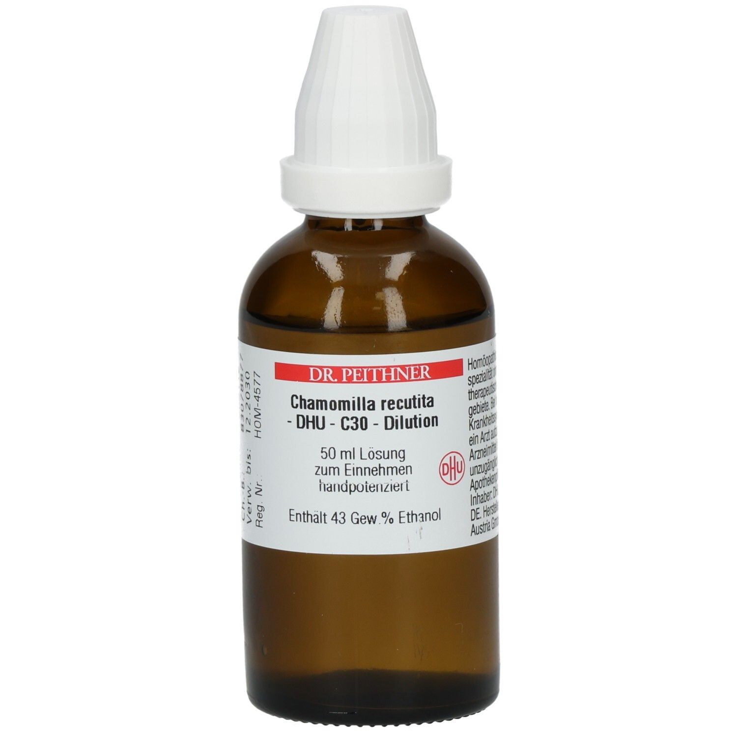 Braune Glasflasche mit weißem Verschluss. Beschriftung: Chamomilla recutita - C30 - Dilution. Etikett mit Produktinformationen.