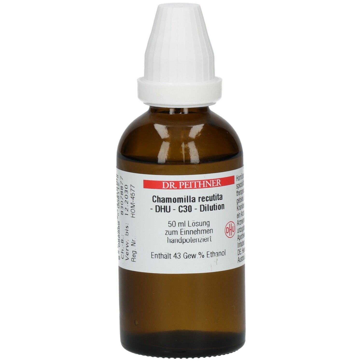 Braune Glasflasche mit weißem Verschluss. Beschriftung: Chamomilla recutita - C30 - Dilution. Etikett mit Produktinformationen.