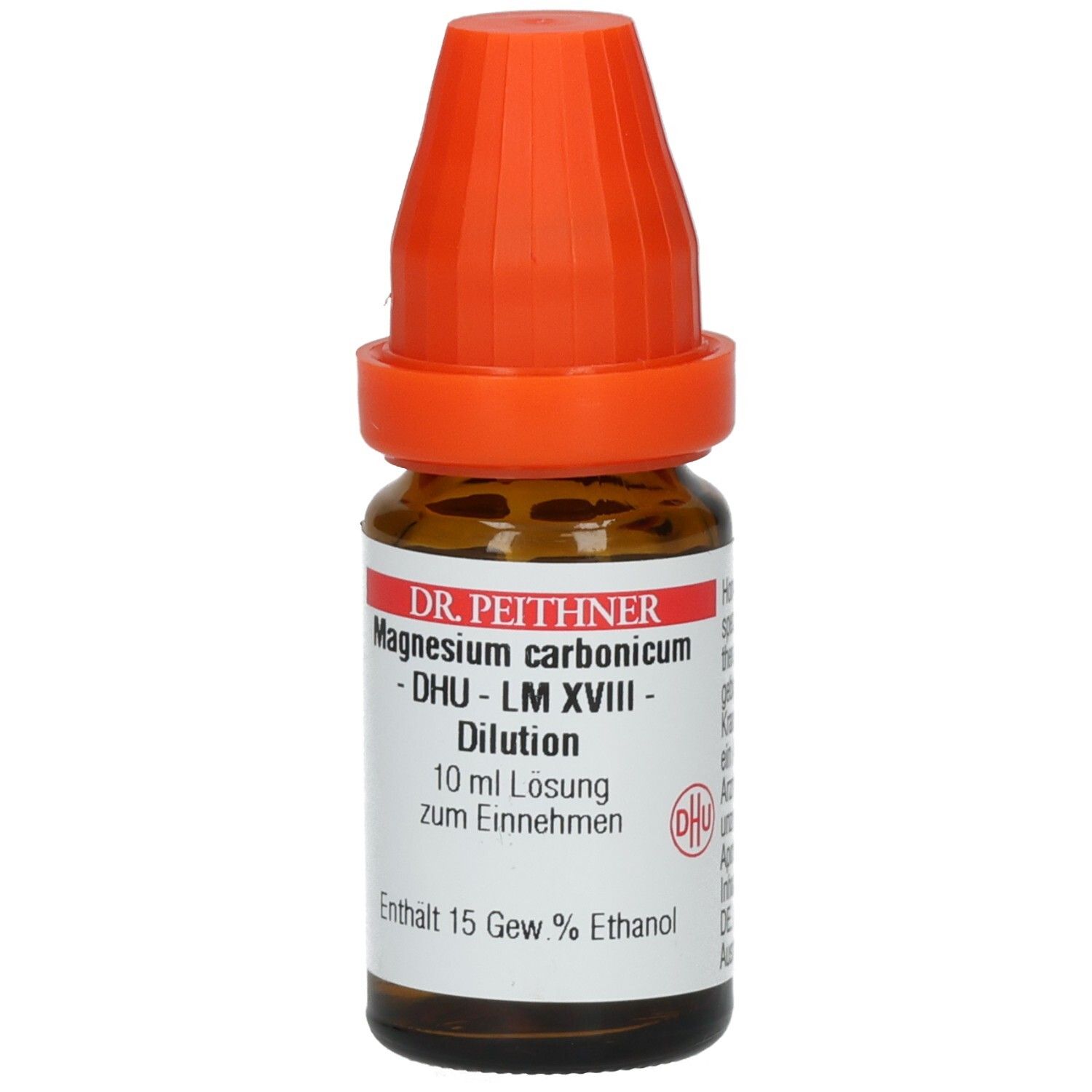 Braune Glasflasche mit orangefarbenem Verschluss. Beschriftung: Magnesium carbonicum DHU LM XVIII Dilution.
