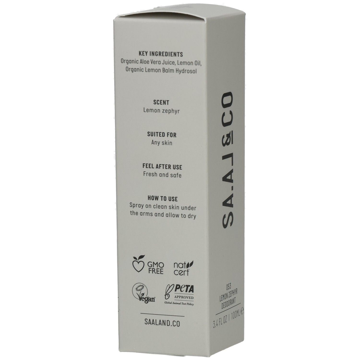 Graue Verpackung mit Text: Key Ingredients, Scent, Suited for, Feel after use, How to use. Logos: GMO Free, Natrue, Vegan, PETA.