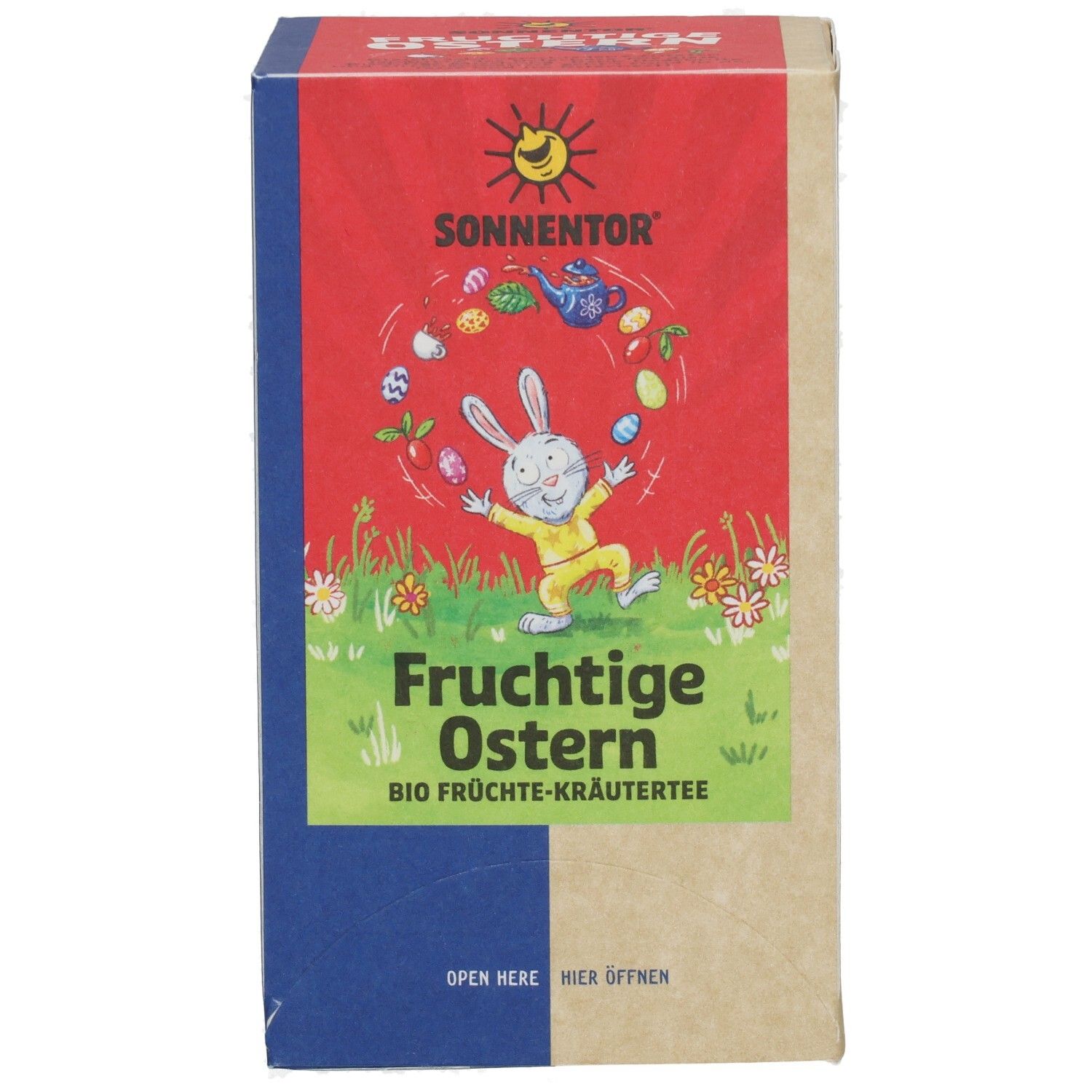 Teebox SONNENTOR Tee Ostern Bio. Roter Deckel mit Logo und Oster-Illustration. Vorderseite mit Hase und Schriftzug. Braune und blaue Seiten.